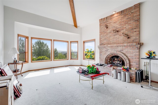 1408 W St NW, Auburn, WA 98001 - carpeted living area with beamed ceiling, a brick fireplace, and a towering ceiling
