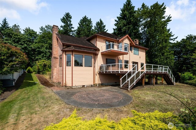 1408 W St NW, Auburn, WA 98001 - rear view of property with a chimney, stairway, a yard, and a balcony