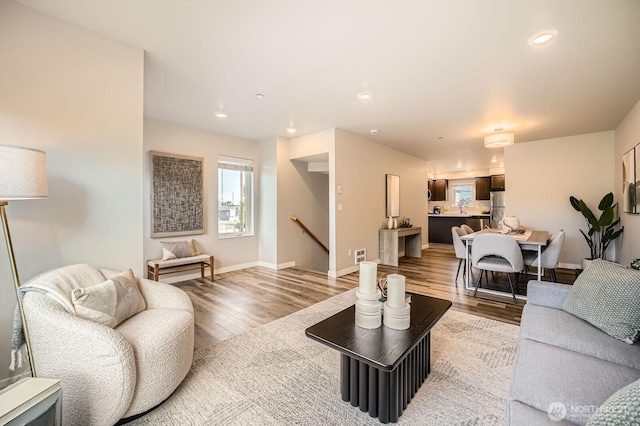 1823 SW 96th Ln, Seattle, WA 98106 - living room featuring light wood-type flooring and recessed lighting