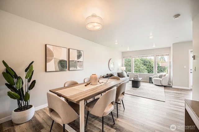 1823 SW 96th Ln, Seattle, WA 98106 - dining space featuring light wood finished floors and recessed lighting