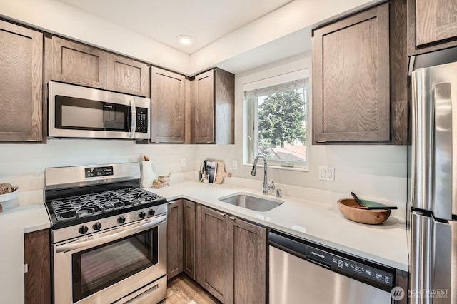 1823 SW 96th Ln, Seattle, WA 98106 - kitchen featuring stainless steel appliances and light countertops