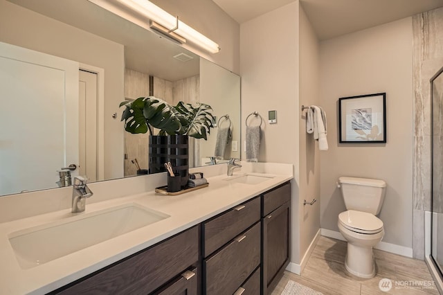 1823 SW 96th Ln, Seattle, WA 98106 - bathroom featuring double vanity, a shower, and wood finished floors