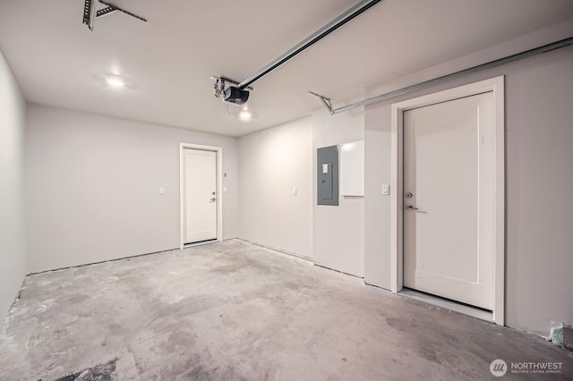 1823 SW 96th Ln, Seattle, WA 98106 - garage featuring electric panel and a garage door opener