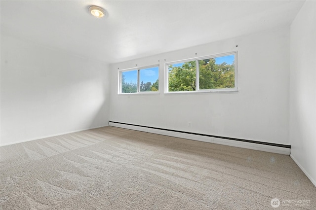 7818 185th Pl SW, Edmonds, WA 98026 - empty room featuring a baseboard radiator and carpet floors