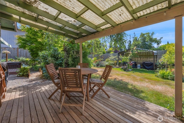 7818 185th Pl SW, Edmonds, WA 98026 - deck featuring a fenced backyard, outdoor dining area, and a hot tub