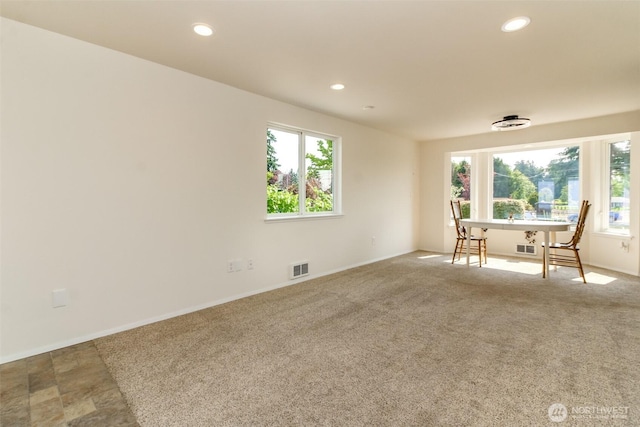 10510 66th Ave E, Puyallup, WA 98373 - empty room with plenty of natural light, recessed lighting, a desk, and carpet