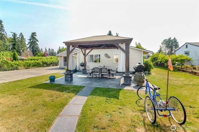 10510 66th Ave E, Puyallup, WA 98373 - rear view of house with a gazebo, a patio area, and a lawn