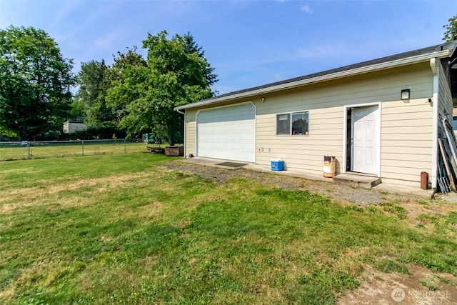 10510 66th Ave E, Puyallup, WA 98373 - rear view of property with a garage