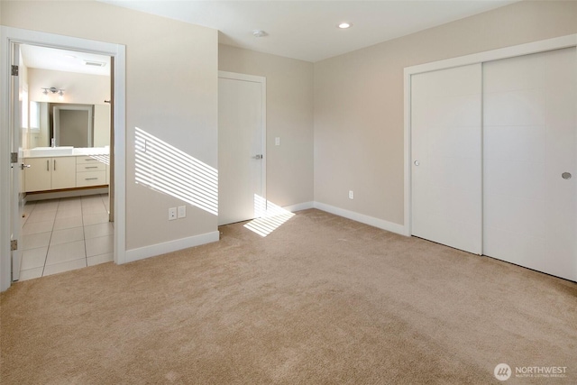 11838 79th Ave S, Seattle, WA 98178 - unfurnished bedroom with light carpet, ensuite bathroom, a closet, and recessed lighting