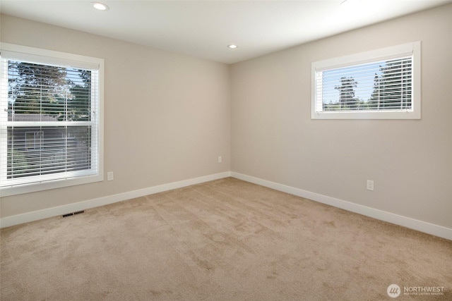 11838 79th Ave S, Seattle, WA 98178 - spare room with healthy amount of natural light, carpet floors, and recessed lighting