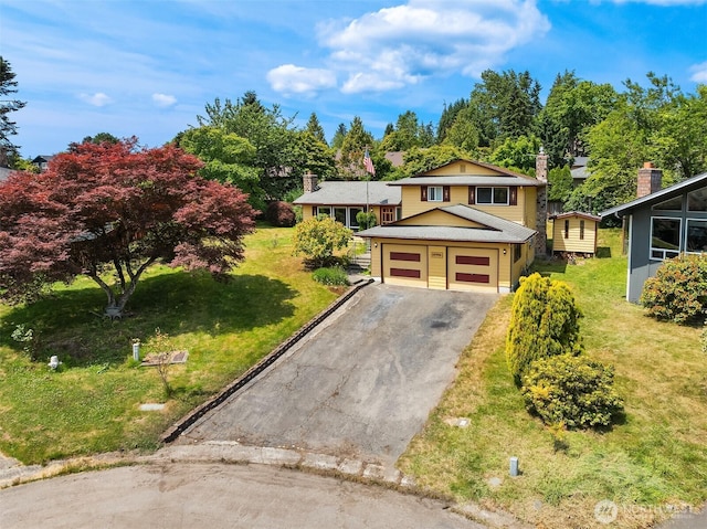 10704 NE 200th Pl, Bothell, WA 98011 - view of front of house featuring asphalt driveway, a chimney, and an attached garage