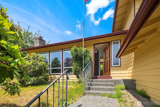 10704 NE 200th Pl, Bothell, WA 98011 - doorway to property with a chimney