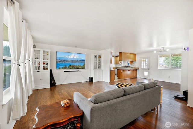 1815 181st St E, Spanaway, WA 98387 - living area with dark wood-style flooring