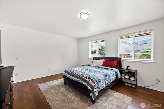 1815 181st St E, Spanaway, WA 98387 - bedroom featuring wood finished floors and baseboards