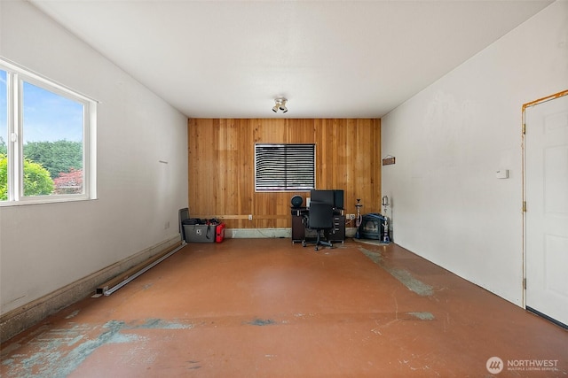 1815 181st St E, Spanaway, WA 98387 - unfurnished office featuring wooden walls and concrete floors