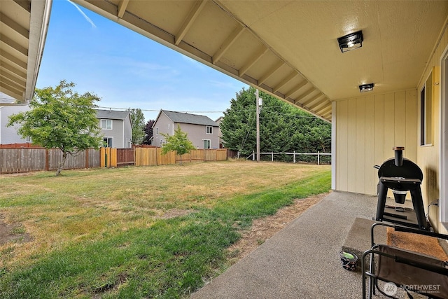 1815 181st St E, Spanaway, WA 98387 - fenced backyard with a patio area