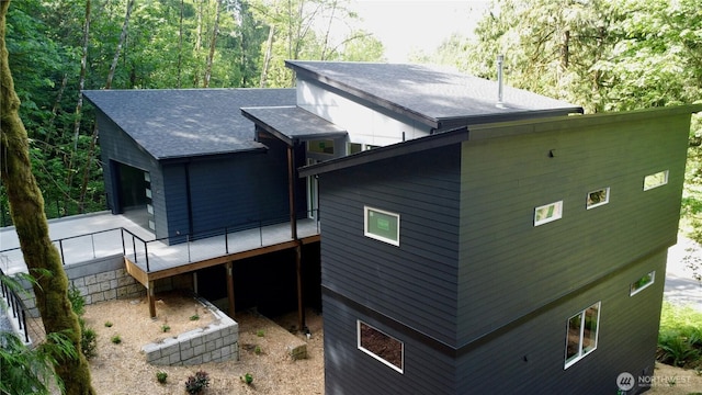 15 Sudden Valley Dr, Bellingham, WA 98229 - rear view of house with a wooden deck and a shingled roof