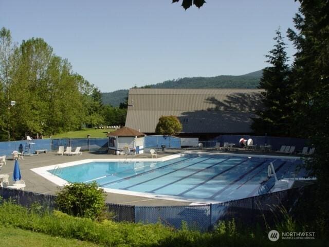 15 Sudden Valley Dr, Bellingham, WA 98229 - community pool with a mountain view and a patio area