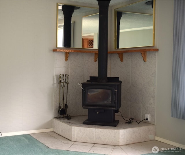 81 Ridge Pl, Sequim, WA 98382 - detailed view of baseboards and a wood stove