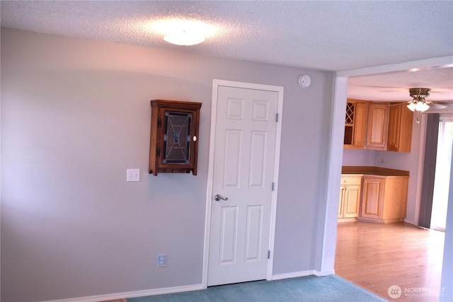 81 Ridge Pl, Sequim, WA 98382 - spare room with a textured ceiling, a smoke detector, a ceiling fan, and light carpet