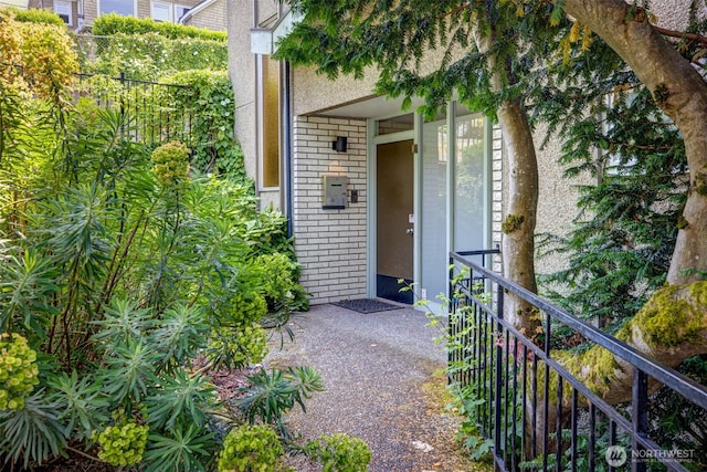 303 N 44th St Unit 105, Seattle, WA 98103 - view of exterior entry featuring brick siding