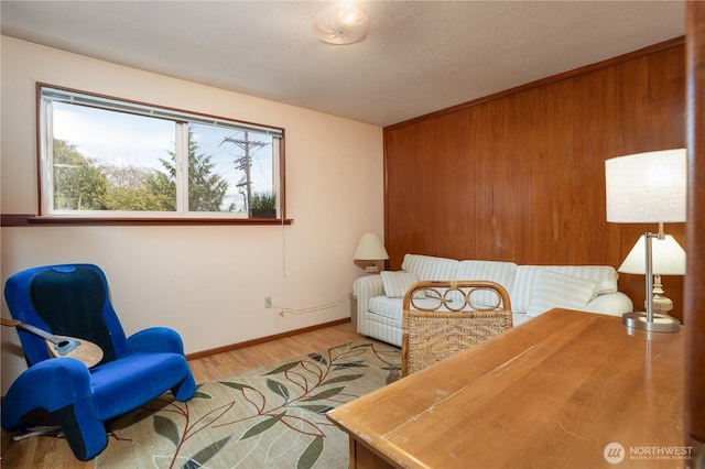 3701N Whitman St, Tacoma, WA 98407 - sitting room with light wood finished floors and wooden walls