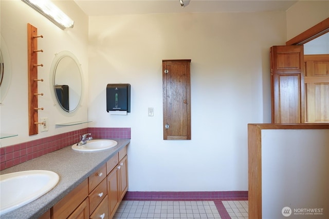 3701N Whitman St, Tacoma, WA 98407 - full bathroom with double vanity, tasteful backsplash, and tile patterned flooring