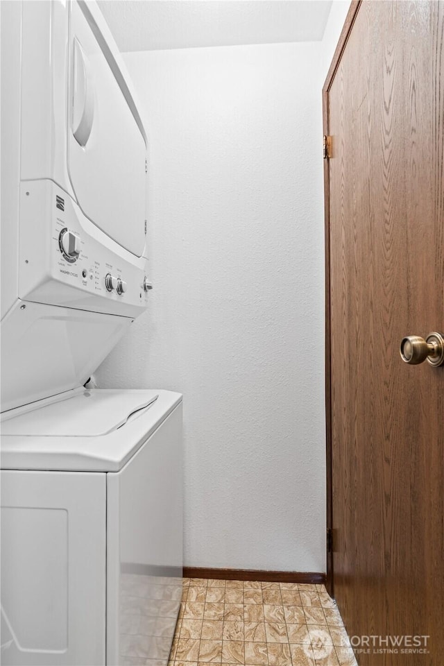 17529 151st Ave SE Unit 7-11, Renton, WA 98058 - washroom featuring stacked washing machine and dryer