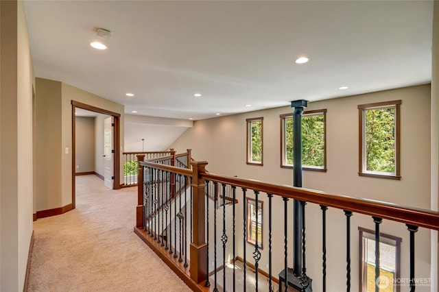 5728 SE 159th Ave, Snohomish, WA 98290 - hall featuring recessed lighting, plenty of natural light, an upstairs landing, and light colored carpet
