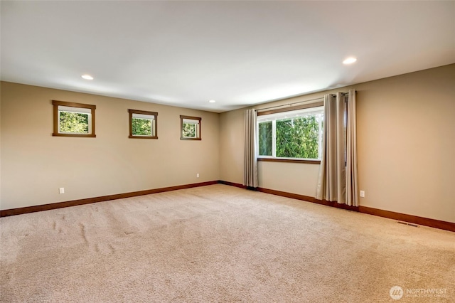 5728 SE 159th Ave, Snohomish, WA 98290 - carpeted spare room with baseboards and recessed lighting