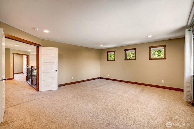 5728 SE 159th Ave, Snohomish, WA 98290 - spare room featuring light carpet, recessed lighting, and a smoke detector