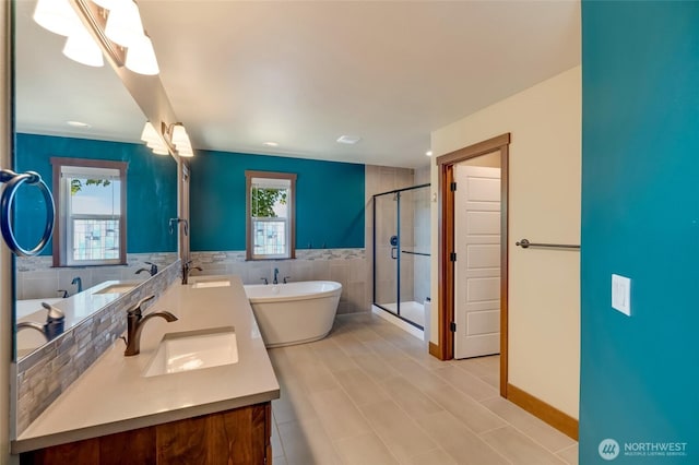 5728 SE 159th Ave, Snohomish, WA 98290 - full bath featuring double vanity, a freestanding tub, a stall shower, and tile patterned floors