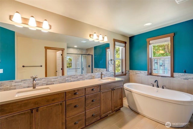 5728 SE 159th Ave, Snohomish, WA 98290 - full bath featuring tile walls, a shower stall, tile patterned flooring, a freestanding bath, and double vanity