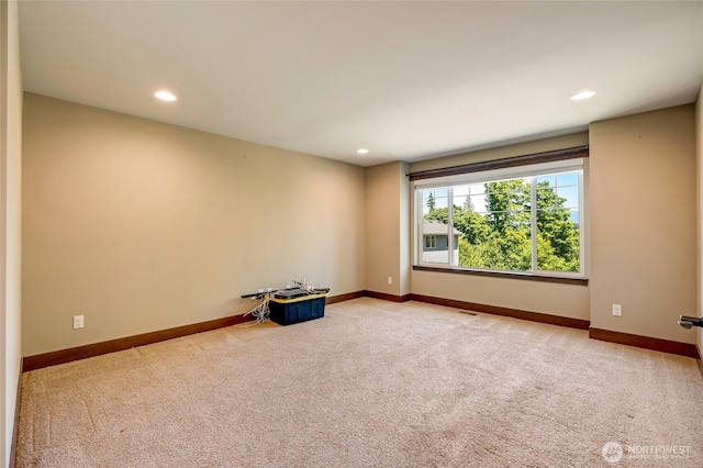 5728 SE 159th Ave, Snohomish, WA 98290 - empty room featuring light colored carpet and recessed lighting