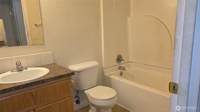 1040 Columbia River Dr Unit 1, Vancouver, WA 98664 - bathroom with backsplash, vanity, and washtub / shower combination