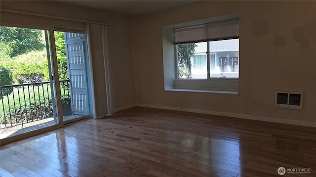 1040 Columbia River Dr Unit 1, Vancouver, WA 98664 - unfurnished room with hardwood / wood-style flooring and heating unit