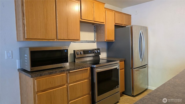 1040 Columbia River Dr Unit 1, Vancouver, WA 98664 - kitchen featuring appliances with stainless steel finishes and dark countertops