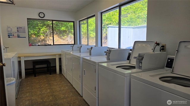 1040 Columbia River Dr Unit 1, Vancouver, WA 98664 - communal laundry room featuring washer and dryer and dark tile patterned flooring