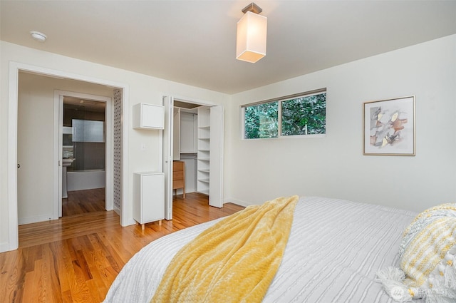 2329 NE 103rd St, Seattle, WA 98125 - bedroom featuring light wood-style floors and a closet