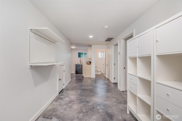 2329 NE 103rd St, Seattle, WA 98125 - hallway featuring finished concrete floors and recessed lighting