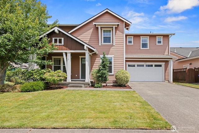 8910 Buttercup St SE, Tumwater, WA 98501 - view of front of property with concrete driveway, board and batten siding, and an attached garage