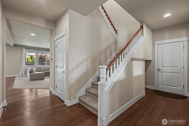 8910 Buttercup St SE, Tumwater, WA 98501 - staircase featuring wood finished floors and recessed lighting