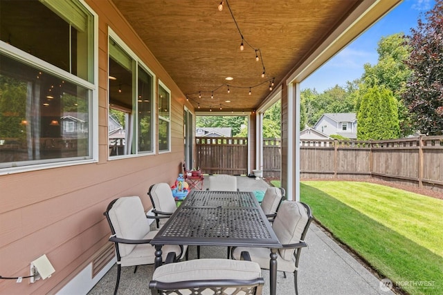 8910 Buttercup St SE, Tumwater, WA 98501 - fenced backyard with outdoor dining area