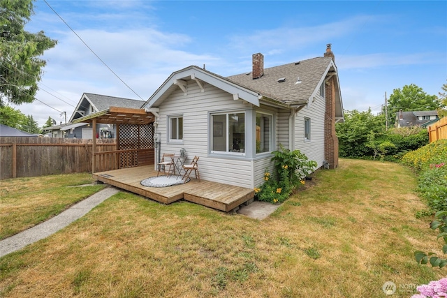 1211 S 41st St, Tacoma, WA 98418 - back of house featuring a wooden deck, a shingled roof, and a chimney