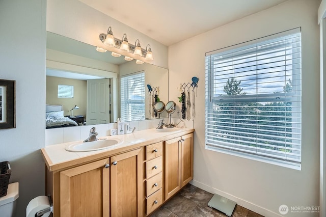 23120 SE Black Nugget Rd Unit D1, Issaquah, WA 98029 - ensuite bathroom with double vanity and baseboards