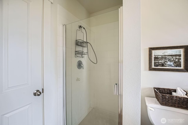 23120 SE Black Nugget Rd Unit D1, Issaquah, WA 98029 - bathroom featuring a shower stall and toilet