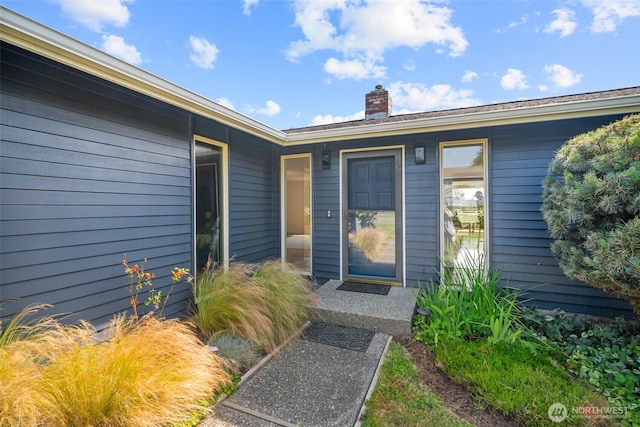 6084 Summit View Pl, Ferndale, WA 98248 - doorway to property with a chimney