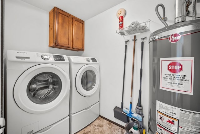 6084 Summit View Pl, Ferndale, WA 98248 - washroom featuring water heater, washer and clothes dryer, and cabinet space