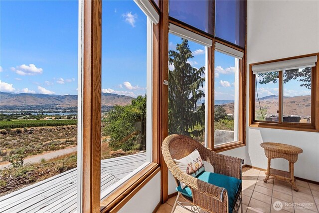 71 Blue Grade Rd, East Wenatchee, WA 98802 - sunroom with a mountain view and tile patterned floors