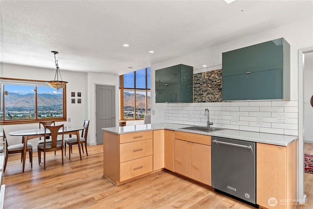 71 Blue Grade Rd, East Wenatchee, WA 98802 - kitchen featuring dishwasher, light brown cabinetry, light countertops, a peninsula, and recessed lighting